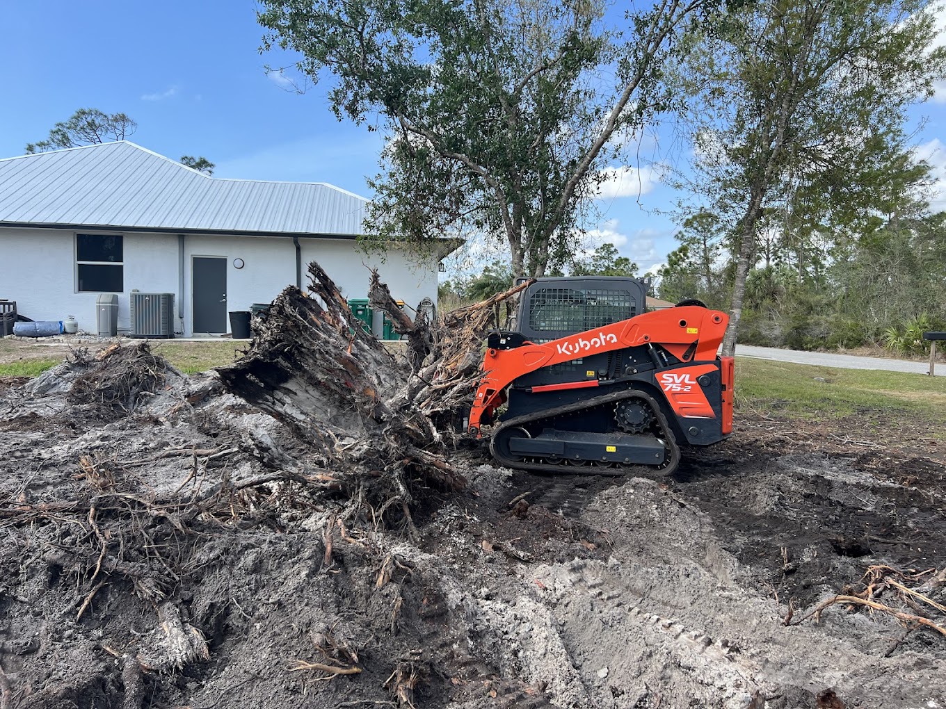 Kubota equipment providing land clearing and property services